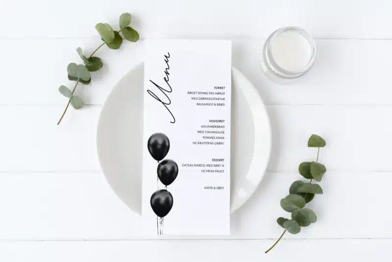 Menukort i simpelt og stilrent design med sorte, festlige balloner.