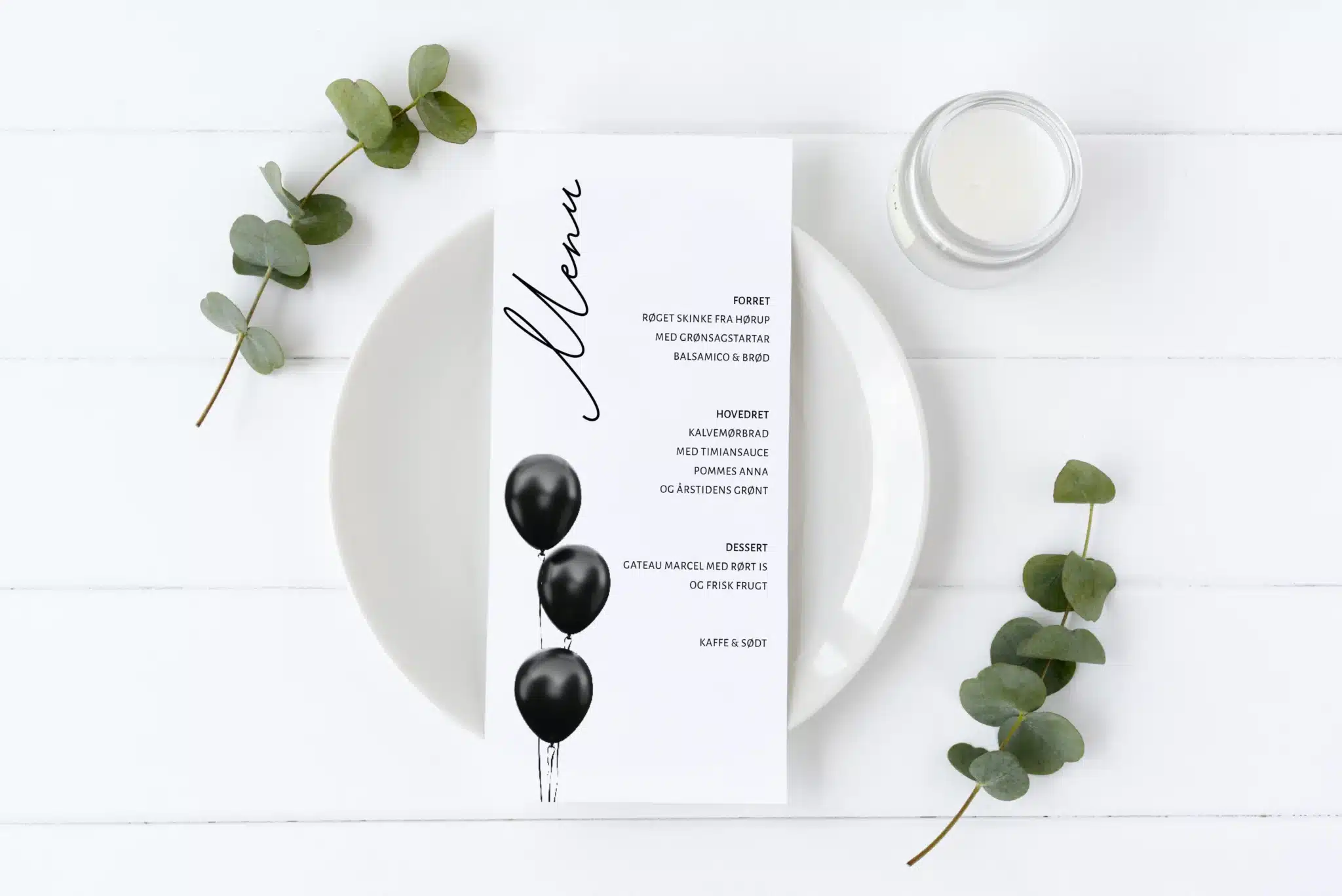 Menukort i simpelt og stilrent design med sorte, festlige balloner.